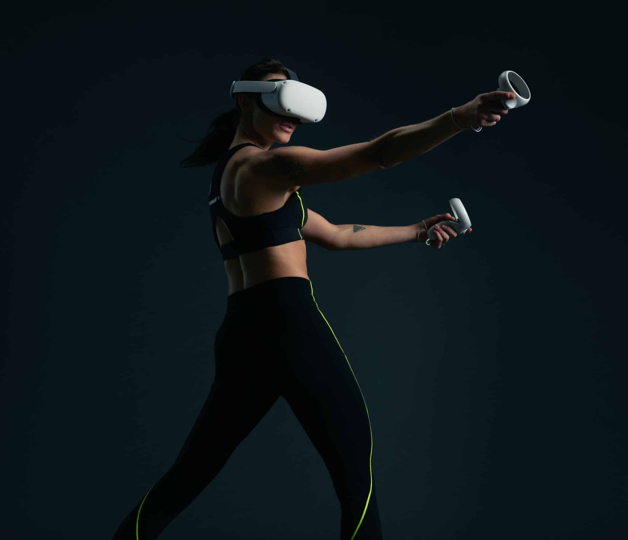 Girl doing her VR workout using VR headset